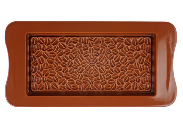 Brown silicone mold for chocolate isolated on a white background