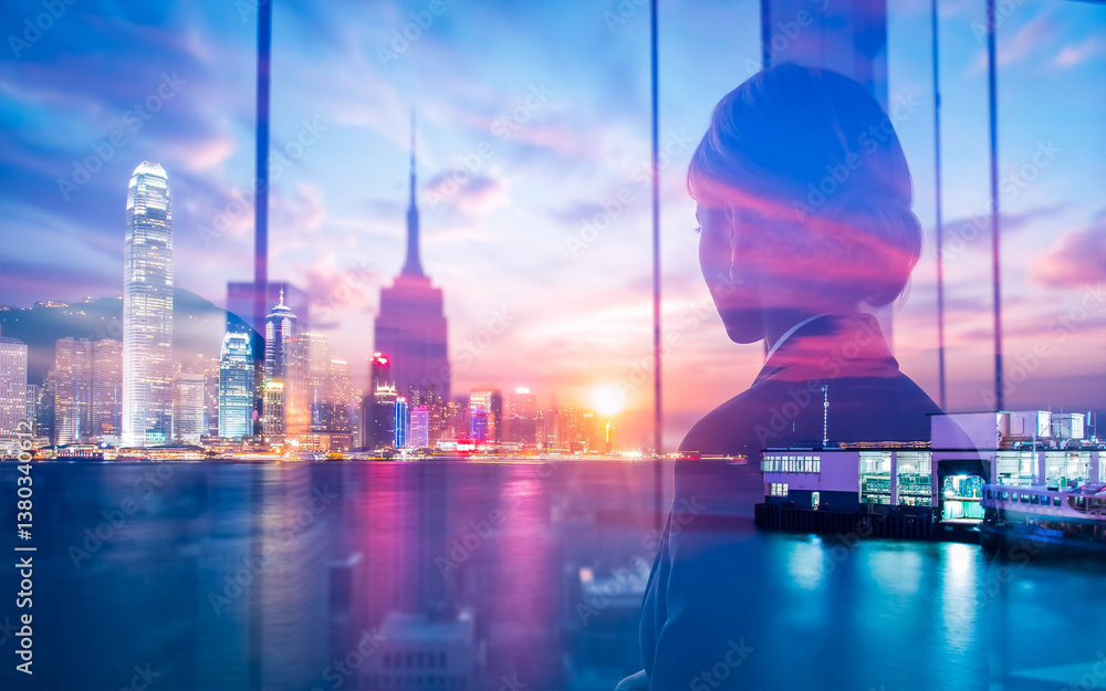 Poster a woman gazes at the vibrant hong kong skyline through a window, creating a double exposure effect b