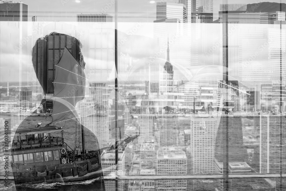 Aufkleber a double exposure image in black and white shows a person overlooking the cityscape of hong kong fro