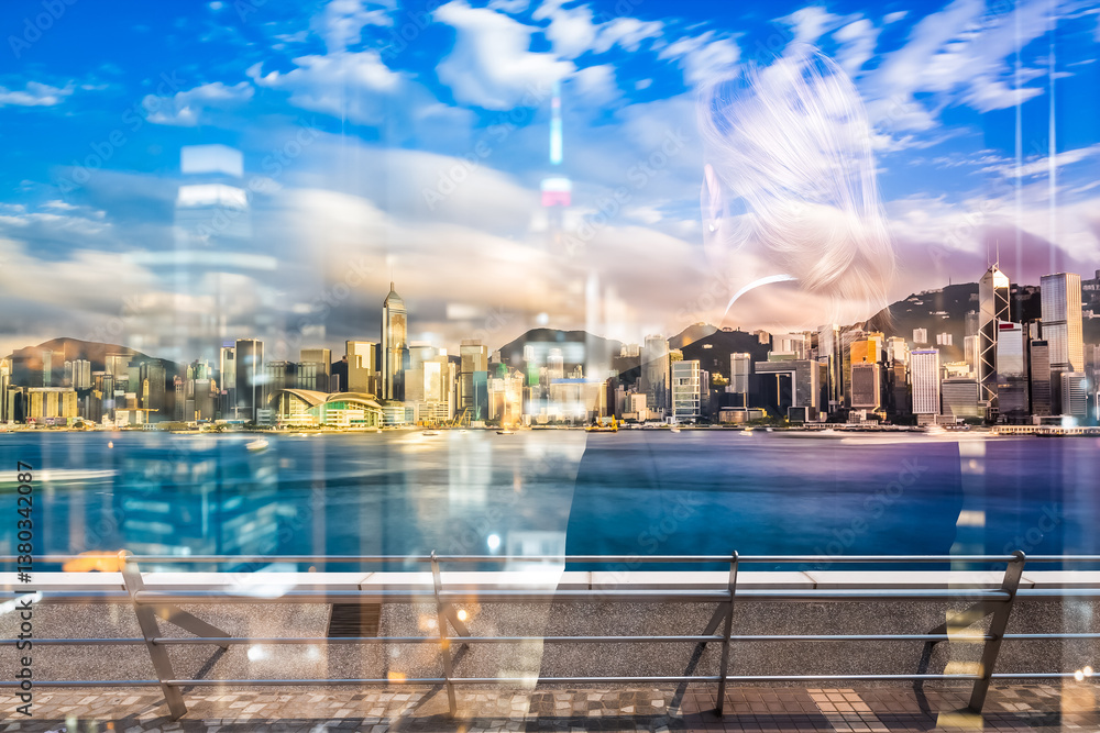 Leinwandbilder a double exposure captures the vibrant hong kong skyline blended with a blurred figure. the cityscap