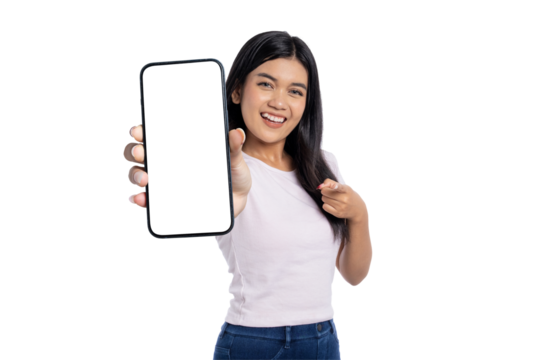 Happy young Asian woman holding a smartphone with blank screen, smiling and pointing, isolated on transparent background