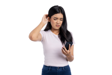 Confused young Asian woman scratching head while looking at smartphone with annoyed expression, isolated on transparent background