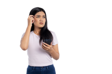 Confused young Asian woman holding smartphone and scratching head with puzzled expression, looking up, isolated on transparent background