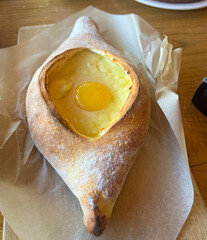 Adjarian khachapuri with egg and butter 