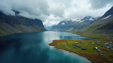 Fototapeta premium Majestic view of a Norwegian landscape at midday, with cloudy skies, captured from above.