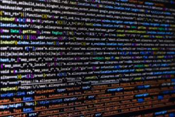 Software source code. Programming code. Programming code on computer screen. Developer working on...