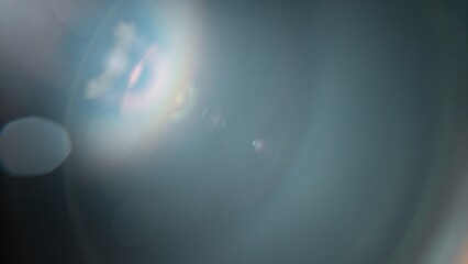 Abstract background of real lens flare for overlay or transition