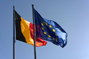 European flag in front of the Belgian flag.
