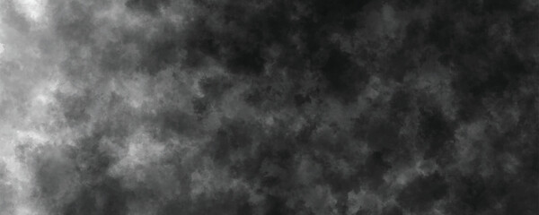 Soft and faded distressed black and gray ink wash background with an artistic appeal

