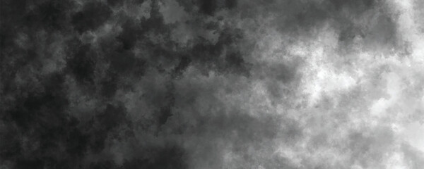 Aged and weathered grunge-style background with cloudy black and gray ink textures

