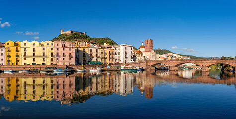 Bosa, Sardinia, Italy - View over the river Temo to the Ponte Vecchio bridge and the historic old...
