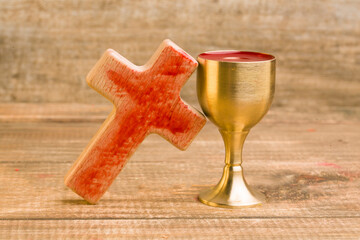 cup with wine and cross