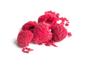 dried raspberries on white background