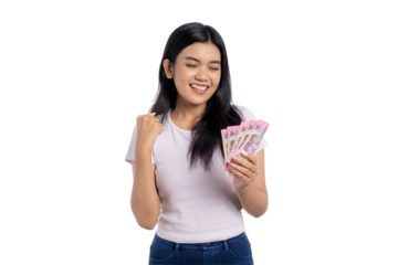 Happy young Asian woman celebrating with cash in hand, smiling and showing excitement, isolated on transparent background