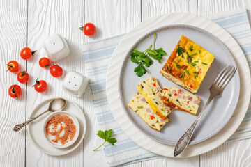 Baked Denver Omelette on a plate with fork
