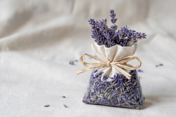 Lavender Sachet with Flowers on a Soft Background  