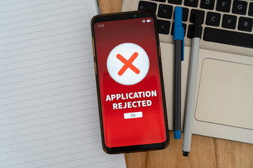 Application rejected notification on smartphone. Concept of getting rejected at new job or account...