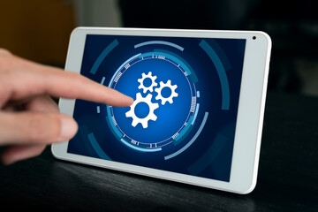 Man doing custom automation process configuration on tablet.