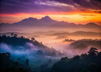 Obraz premium Silhouetted Misty Mountain, Deep Thai Forest - Dramatic Stock Photo