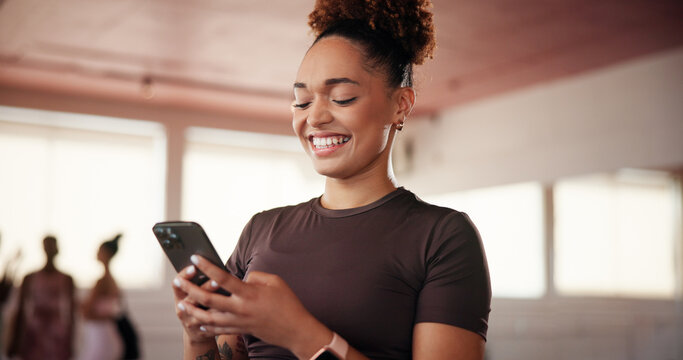 Gym, woman and laughing with smartphone for fitness, exercise video and funny reel on social media. Health club, African female person and happy with mobile for virtual tutorial, workout tips and app