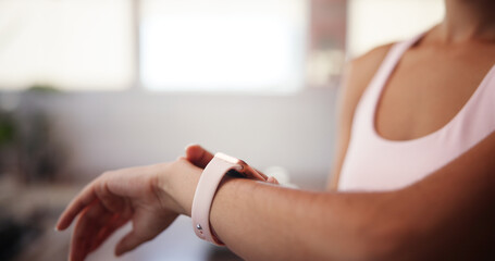 Hands, pilates and watch with woman in studio, tracking performance progress of training routine. Exercise, fitness and time with arm of athlete person in gym for challenge, milestone or workout