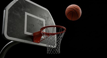 Basketball Hoop and Ball on Black - A basketball arcing towards the hoop, symbolizing skill, competition, success, determination, and teamwork in sports