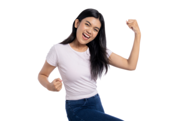Excited young Asian woman celebrating victory with raised arms, showing success or achievement, isolated on transparent background