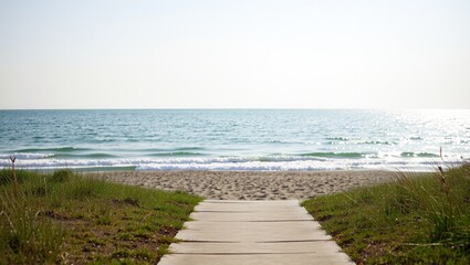 Fototapeta premium Coastal Pathway Leading to the Ocean Shore, Empty Walkway