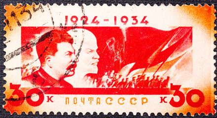 USSR - CIRCA 1944: canceled postal stamp printed in USSR shows Vladimir Lenin and Joseph Stalin,...