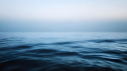 Fototapeta premium Tranquil and Serene Ocean Water Surface Captured During a Misty Morning&nbsp;