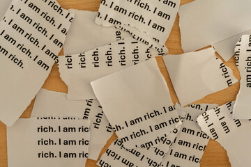 Ripped paper on desk. The text 