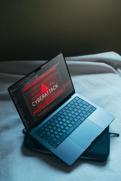 Desktop with system hacked alert hologram interface. Compromised information concept. Internet virus cyber security and cybercrime.