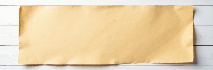 Textured cardboard sheet atop white wood panel, design, layer, surface