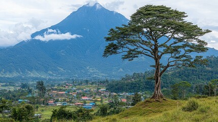 Fototapeta premium Majestic Mountain View with Solitary Tree