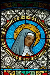Fototapeta premium Stained glass (19th century) of St. Jane Frances de Chantal or Sainte Jeanne de Chantal. Saint of the Catholic Church. Founder of the Order of the Visitation.