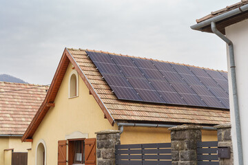 A solar panel on the roof of a countryside house. Sustainable living. Environmental protection....