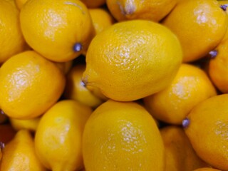 Sicilian lemons displayed at a market.