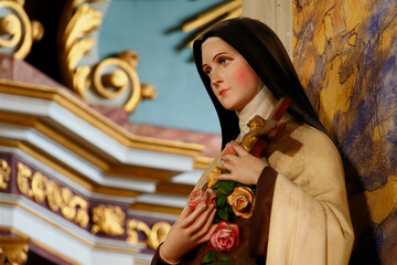 Old Statue of St. Therese of Lisieux or Thérèse de Lisieux, Carmelite nun and Saint of the Roman Catholic Church.