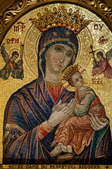 Fototapeta premium Mosaic (early 20th century) of Blessed Virgin Mary holding baby Jesus Christ in her arms.