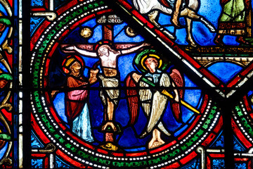 Stained glass (16th century) of Jesus Christ crucified on the cross.