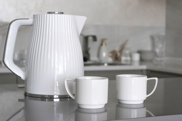 Hotel room tea set - porcelain cups with breakfast tray in stylish interior