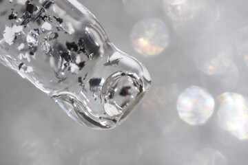 Hyaluronic acid in dropper - macro beauty product photography