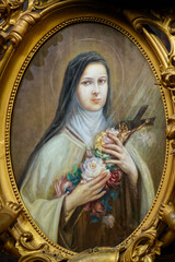 Obraz premium Painting of St. Therese of Lisieux, Carmelite nun and Saint of the Roman Catholic Church. .