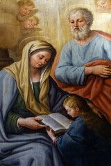 Painting (19th century) of the young Virgin Mary with her parents Saint Anne and Saint Joachim. .