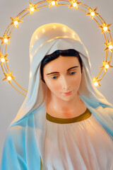 Palmi, ITALY - 11-01-2024: Statue of Blessed Virgin Mary with lights. .