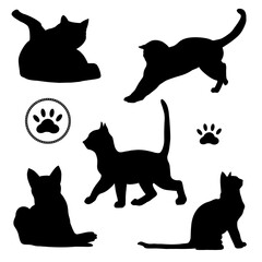 Silhouette designs of playful cats for textiles and wrapping paper