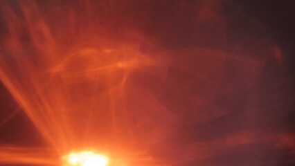 Fiery Abstract Light Reflection with Dark Orange Hues
