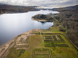 Aerial view of the Roman baths of Bande in the Conchas reservoir