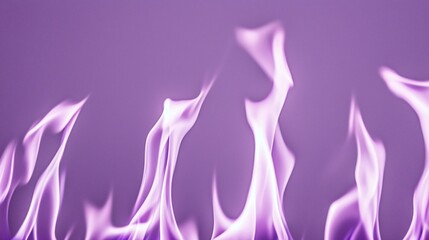 Fototapeta premium Ethereal purple flames rise against a blurred background