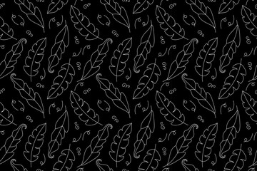 Floral seamless pattern from tropical leaves silhouette. Vector hand drawn illustration on black background